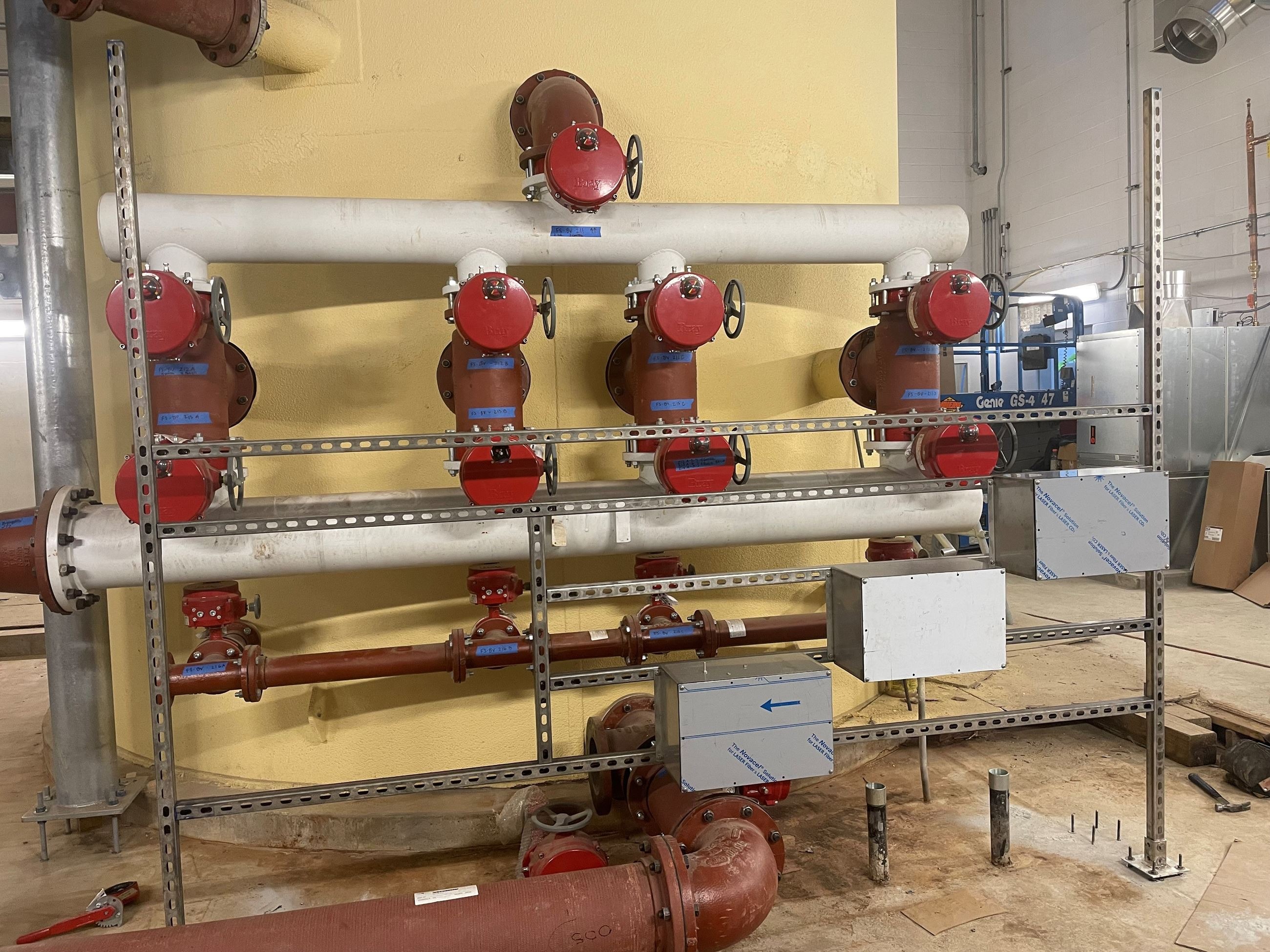 Installation of Electrical Boxes and Unistrut Hangers for Motorized Valves at the Filter Tanks